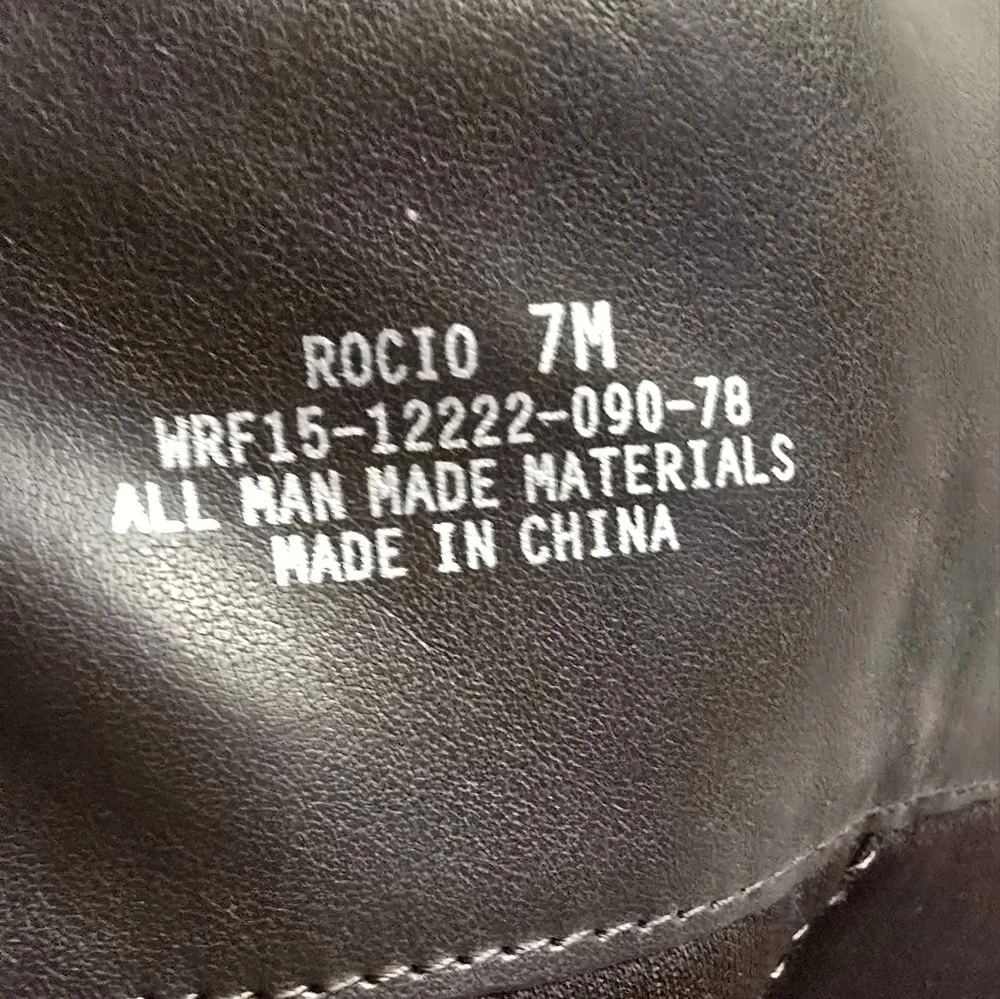 Rocio Black Knee-High Boots. 7